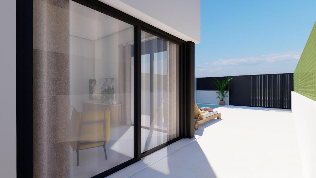 Elegantes villas adosadas de obra nueva con piscina privada cerca del mar en Santiago de la Ribera