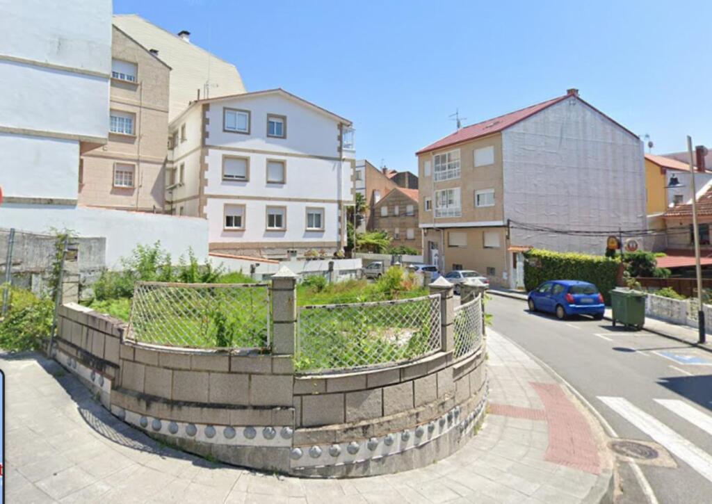 Foto solar edificable con proyecto para 13 viviendas. moaña centro.