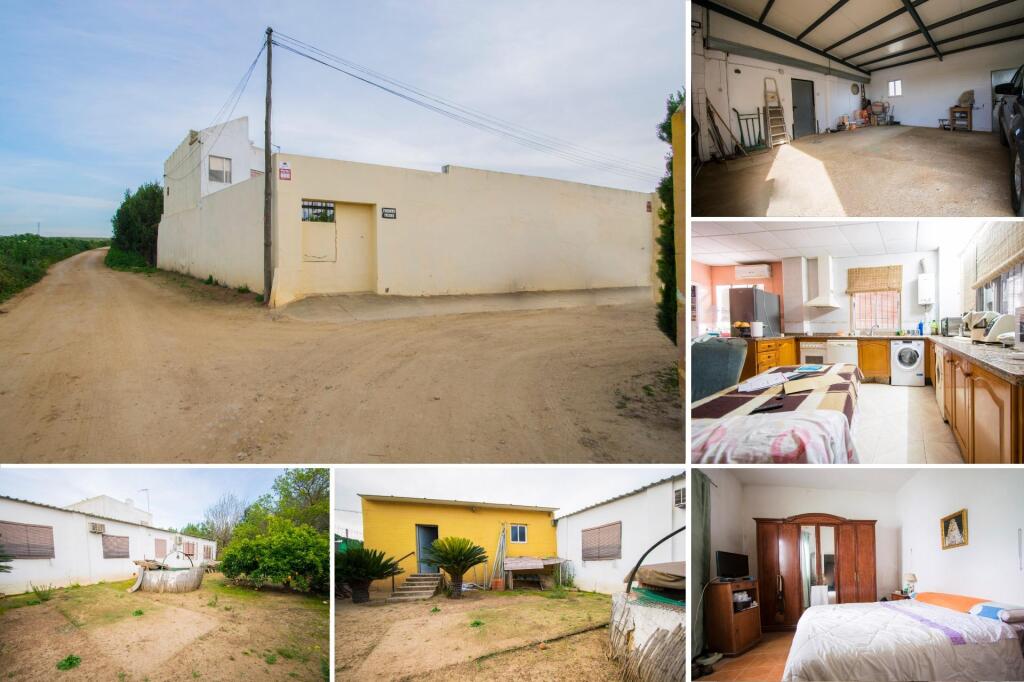 Foto gran terreno en coria del río con casa, almacén y amplio garaje!!!!
